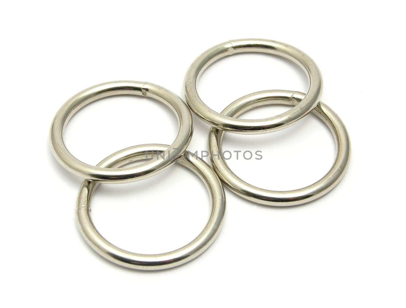 Four rings of metal arranged