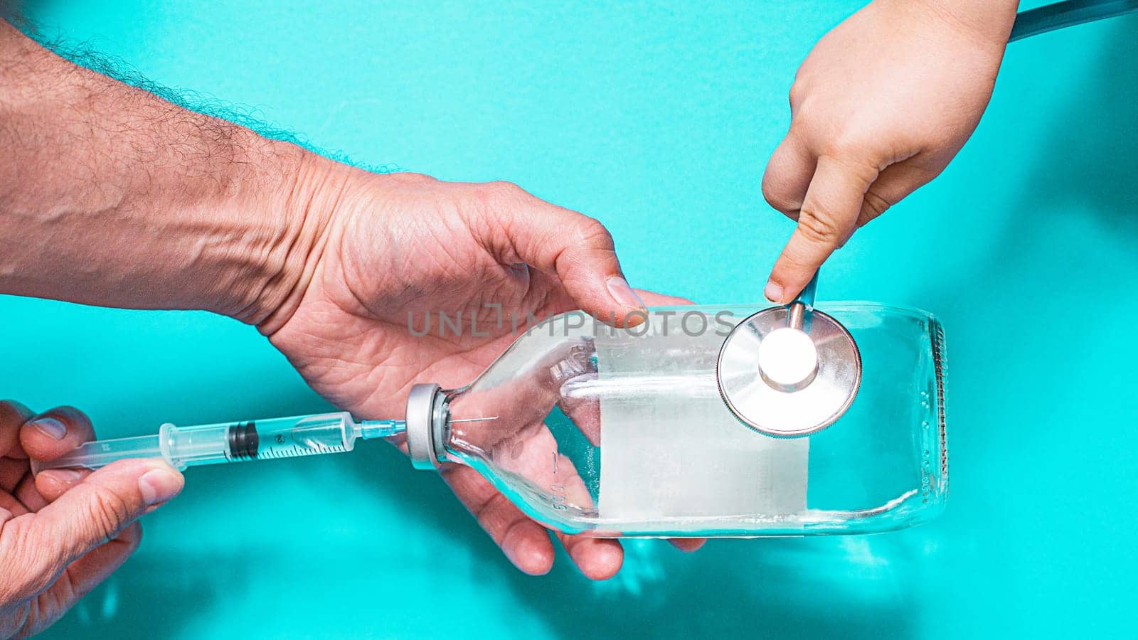 Vaccination debate concept. Biotechnology banner with medical syringe stethoscope and money. Copyspace for text. flatlay.