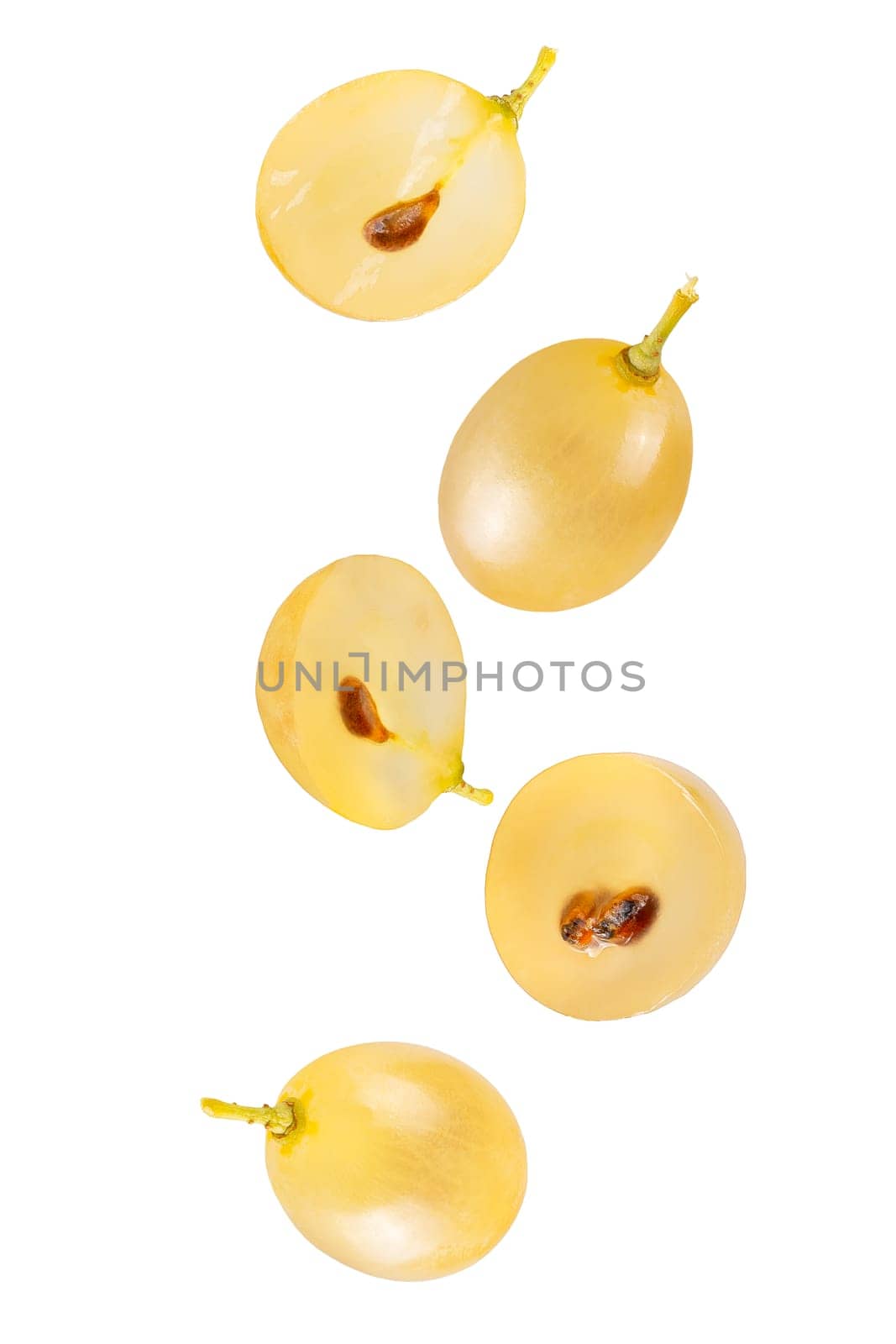 Isolated flying grapes. Five whole and sliced grape fruits falling on white with clipping path as package design element and advertising. Full depth of field.