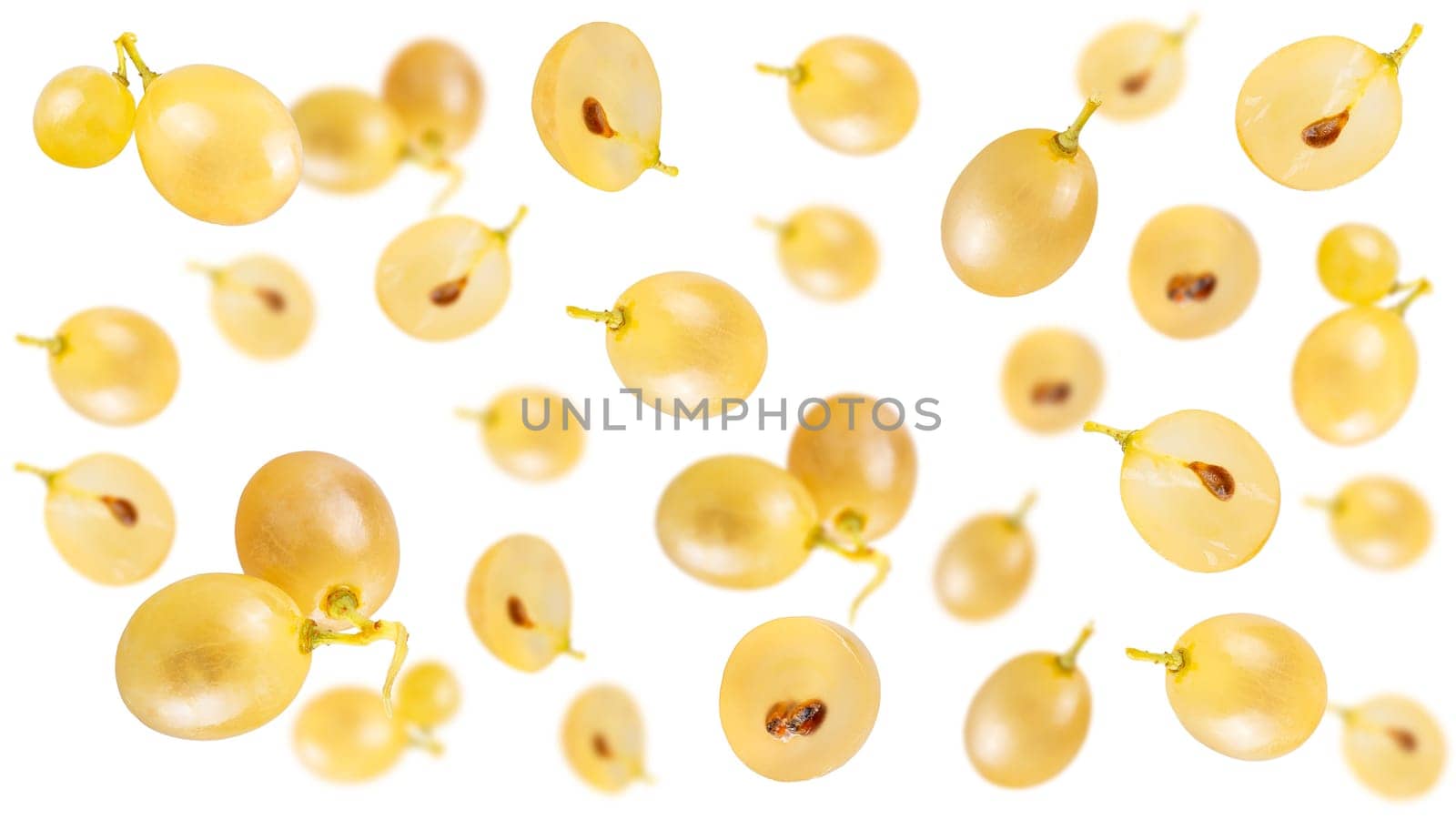 Creative levitation seamless pattern with many ripe grapes on a pastel pink, selective focus.