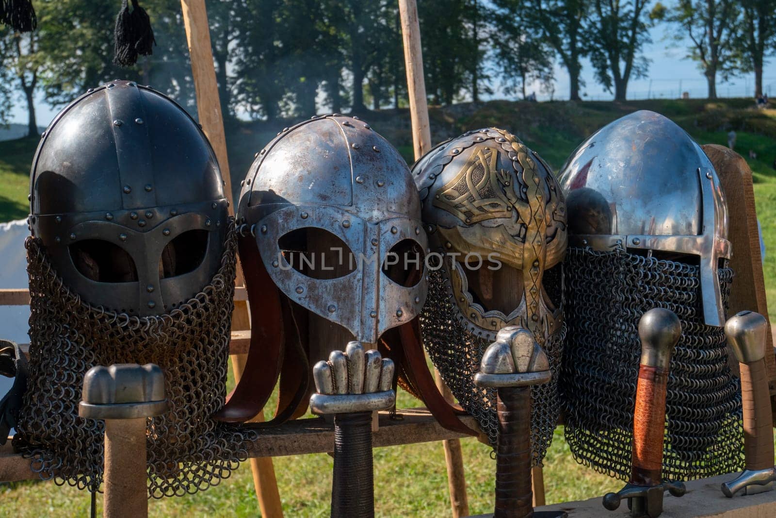 four vintage medieval metal armour fighting helmets