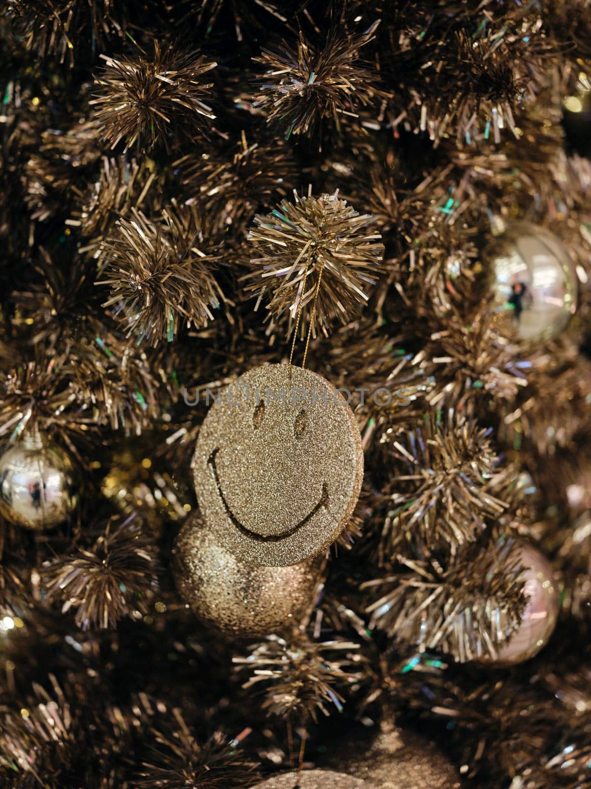 Christmas and Happy new year on christmas tree . Golden tone . SPACE FOR TEXT