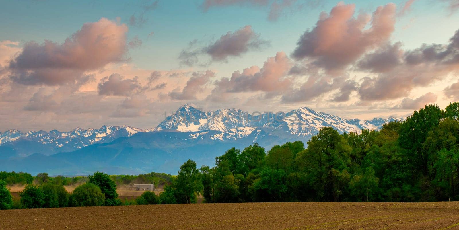 Panorama of countryside, the french Pyrenees mountains in background