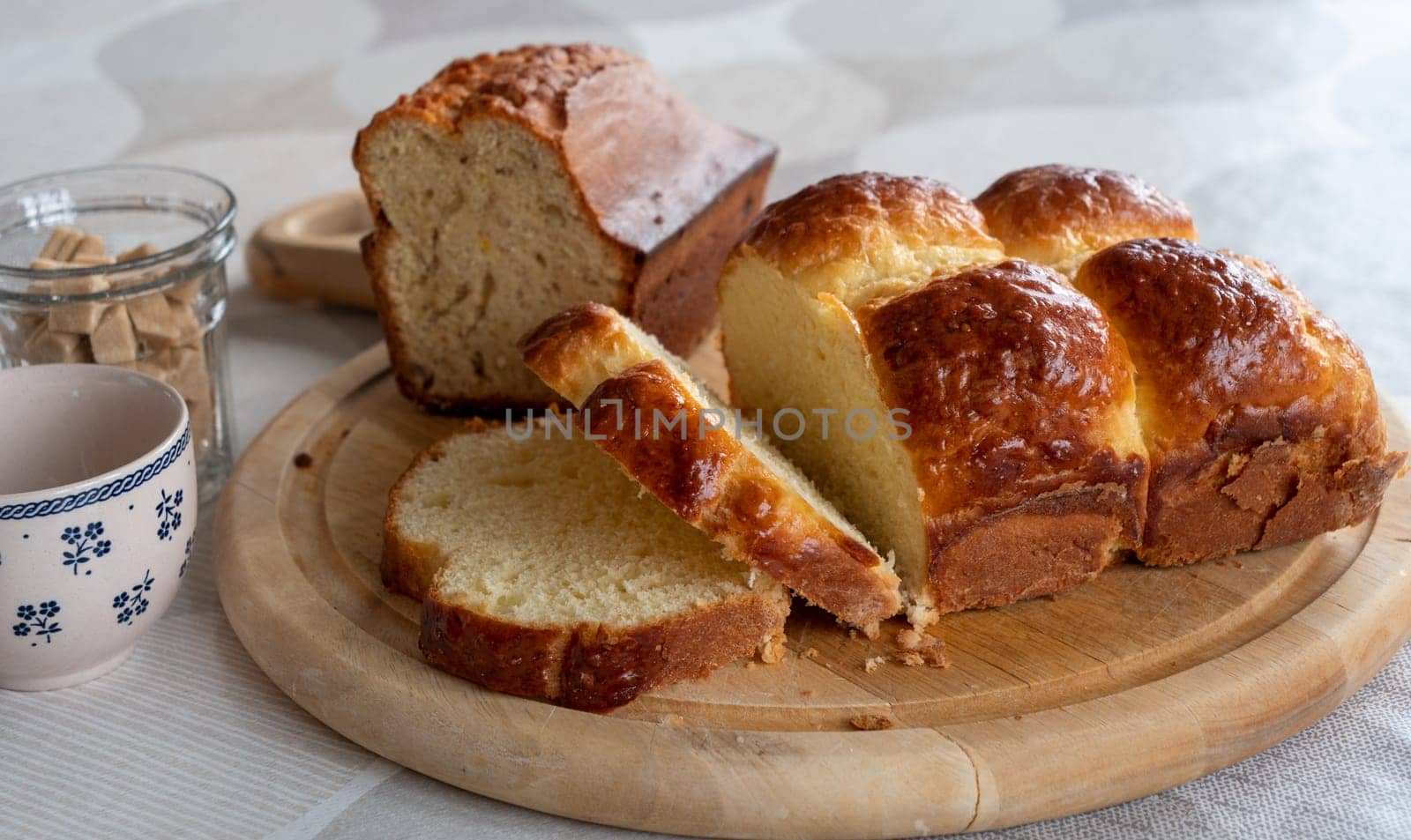 a cup of coffee and homemade brioche