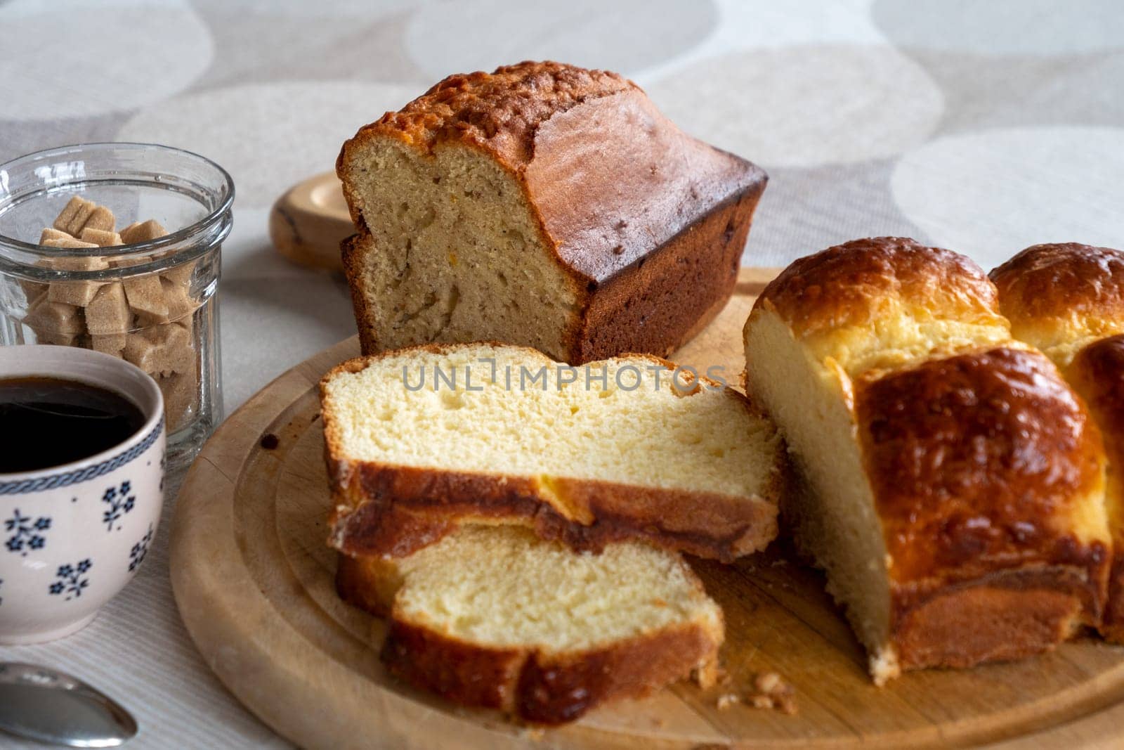 a cup of coffee and homemade brioche