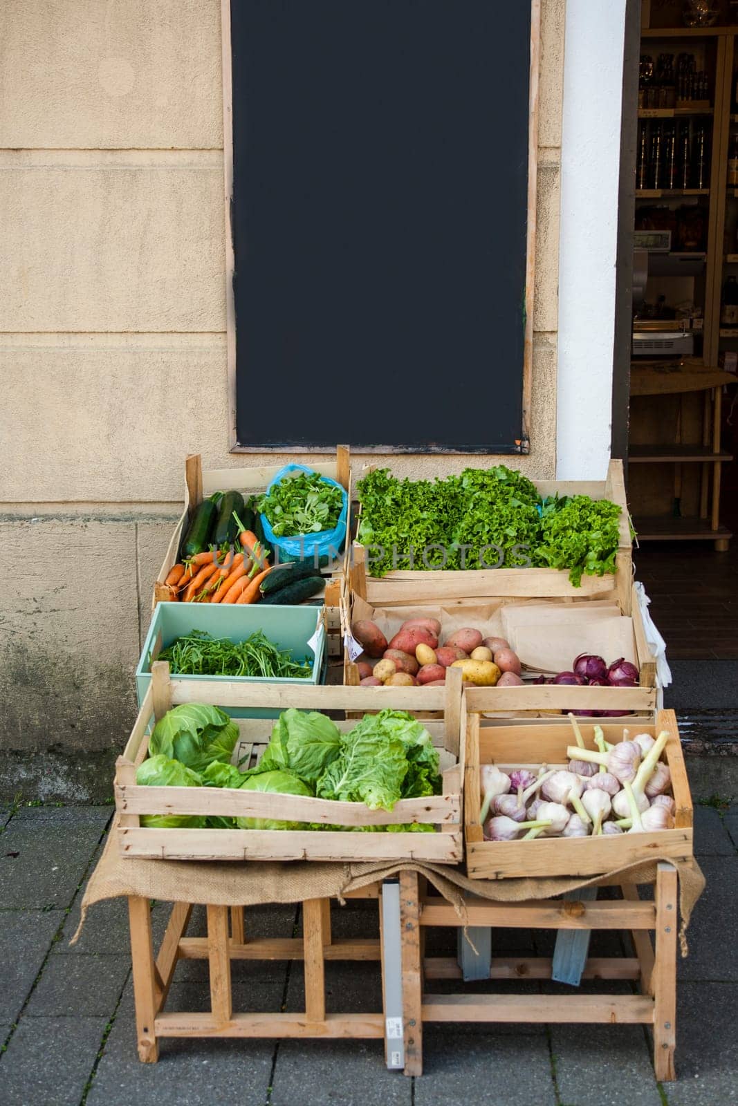 Fresh vegetables in crates. Space for text.