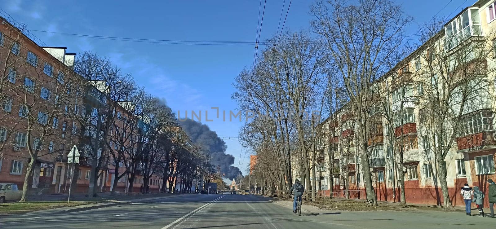 Smoke from fire in Chernihiv city after an air strike by Russian aircraft on the city. Horrors of war in Ukraine. Black smoke against sky. Fire during the war. Henocid
