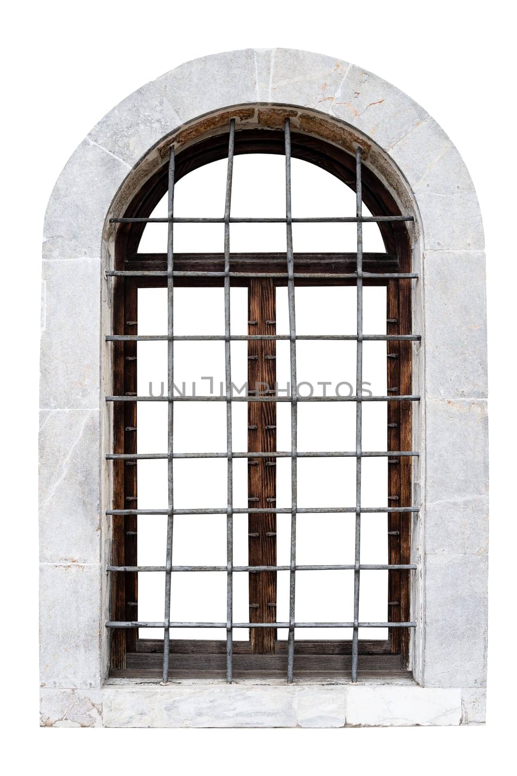 front view closeup of vintage window with stone marble frame protected with metallic railing bars isolated on white