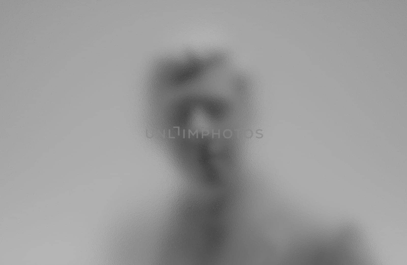 3d illustration privacy concept of blurry silhouette of unrecognizable stranger man in business suit watching outside from behind a transparent white frosted glass office window door