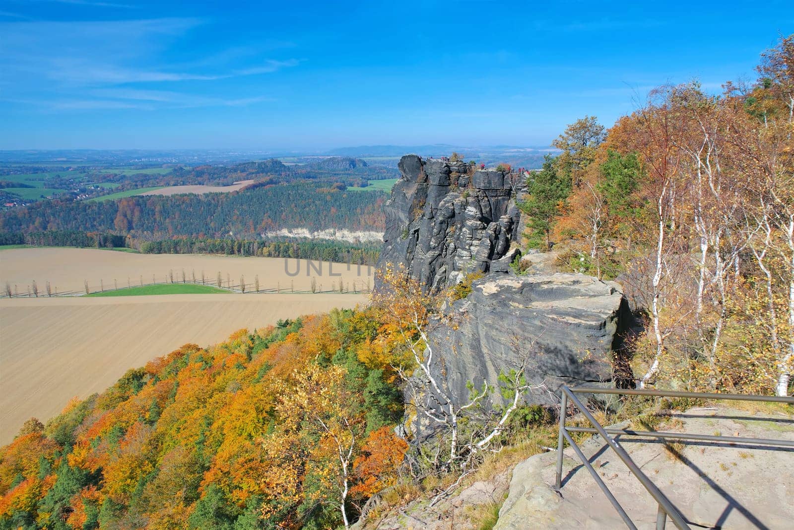 Elbe sandstone mountains in autumn, view from Lilienstein to mountains Baerensteine, Germany