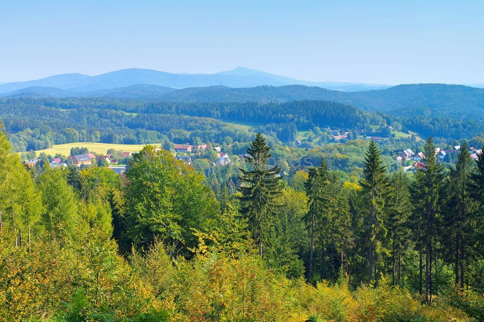 Zittau Mountains view to the village Lueckendorf in autumn