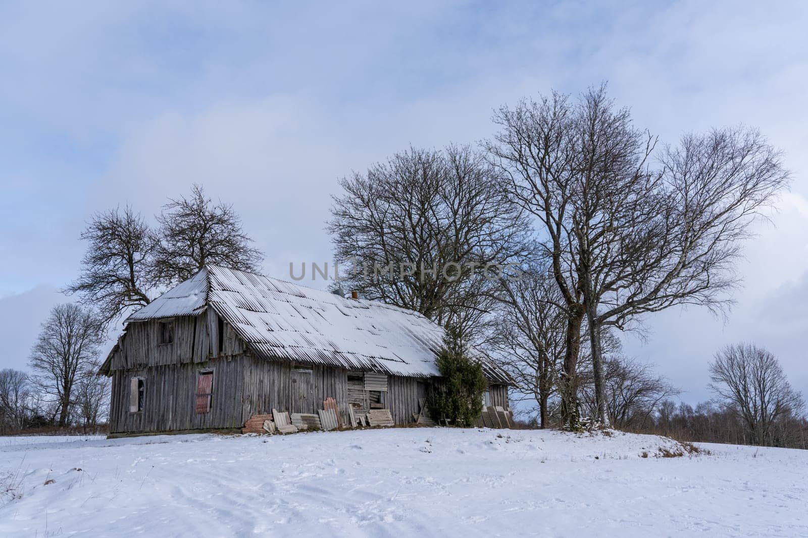 Abandoned village with wooden country houses from old times.