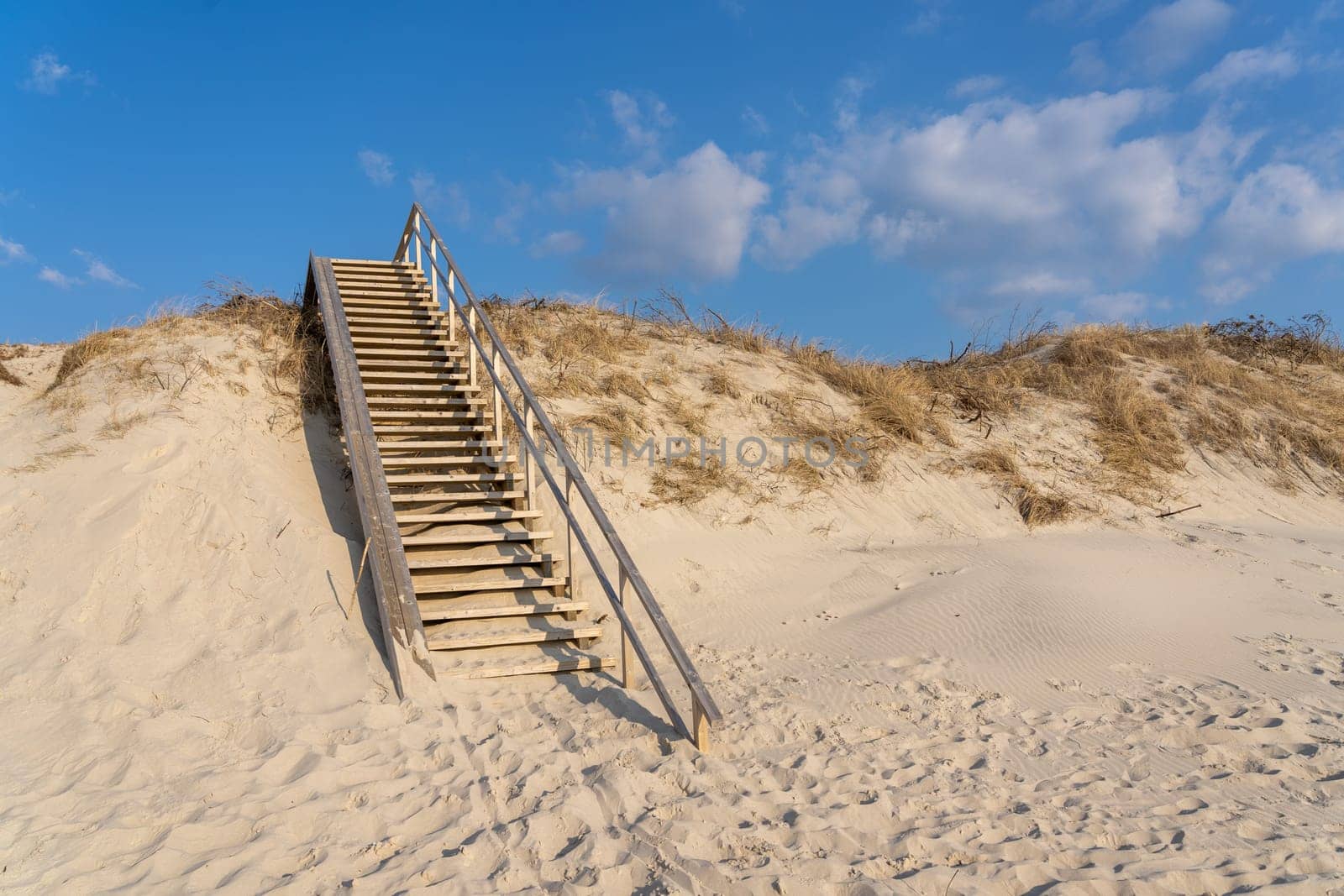 High wooden stairs at the shore. Baltic sea shore.