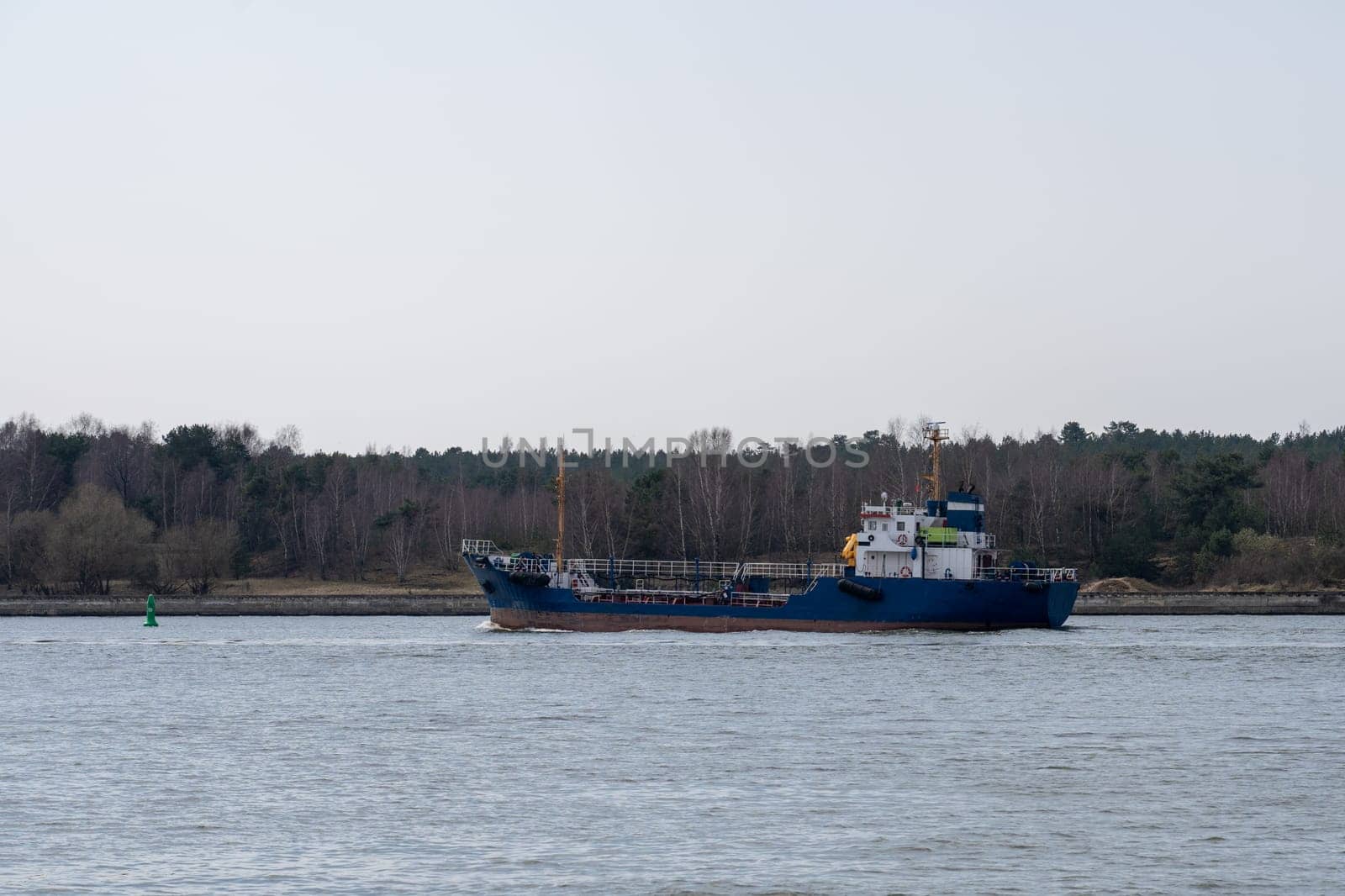 KLAIPĖDA, LITHUANIA - April, 2021 Blue ship in the Baltic Sea