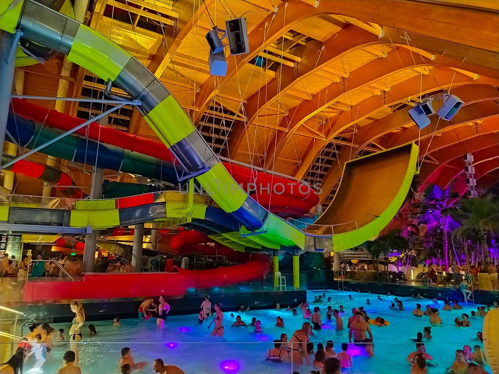 Busteni, Romania - January 1, 2023: People at Therme Bucharest - the largest entertainment and wellness family complex for rest and relaxation