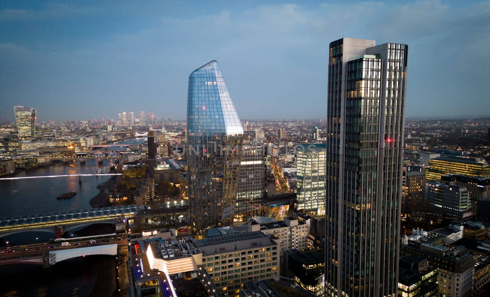 City of London in the evening - aerial view - LONDON, UNITED KINGDOM - DECEMBER 20, 2022