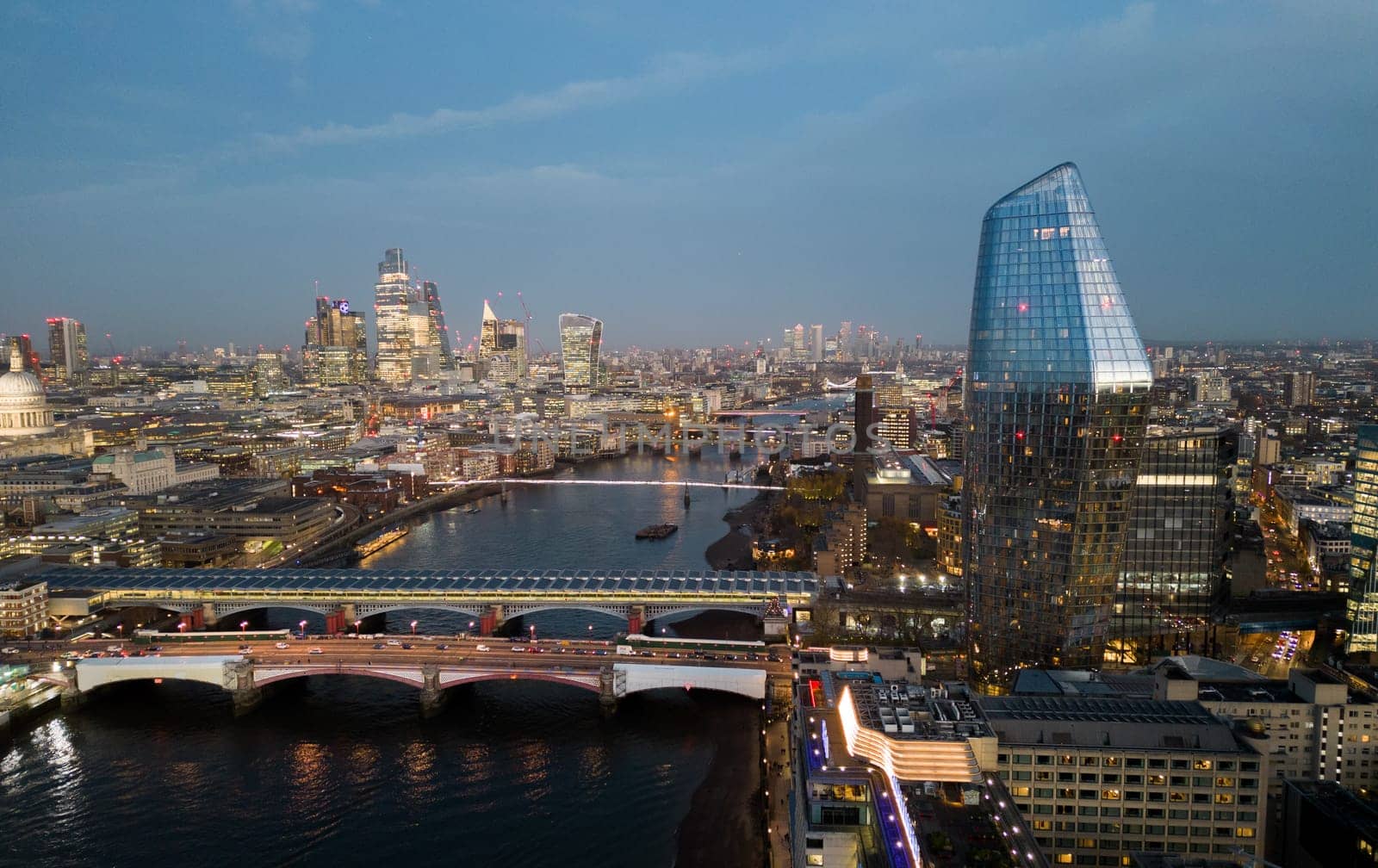 City of London in the evening - aerial view - LONDON, UNITED KINGDOM - DECEMBER 20, 2022