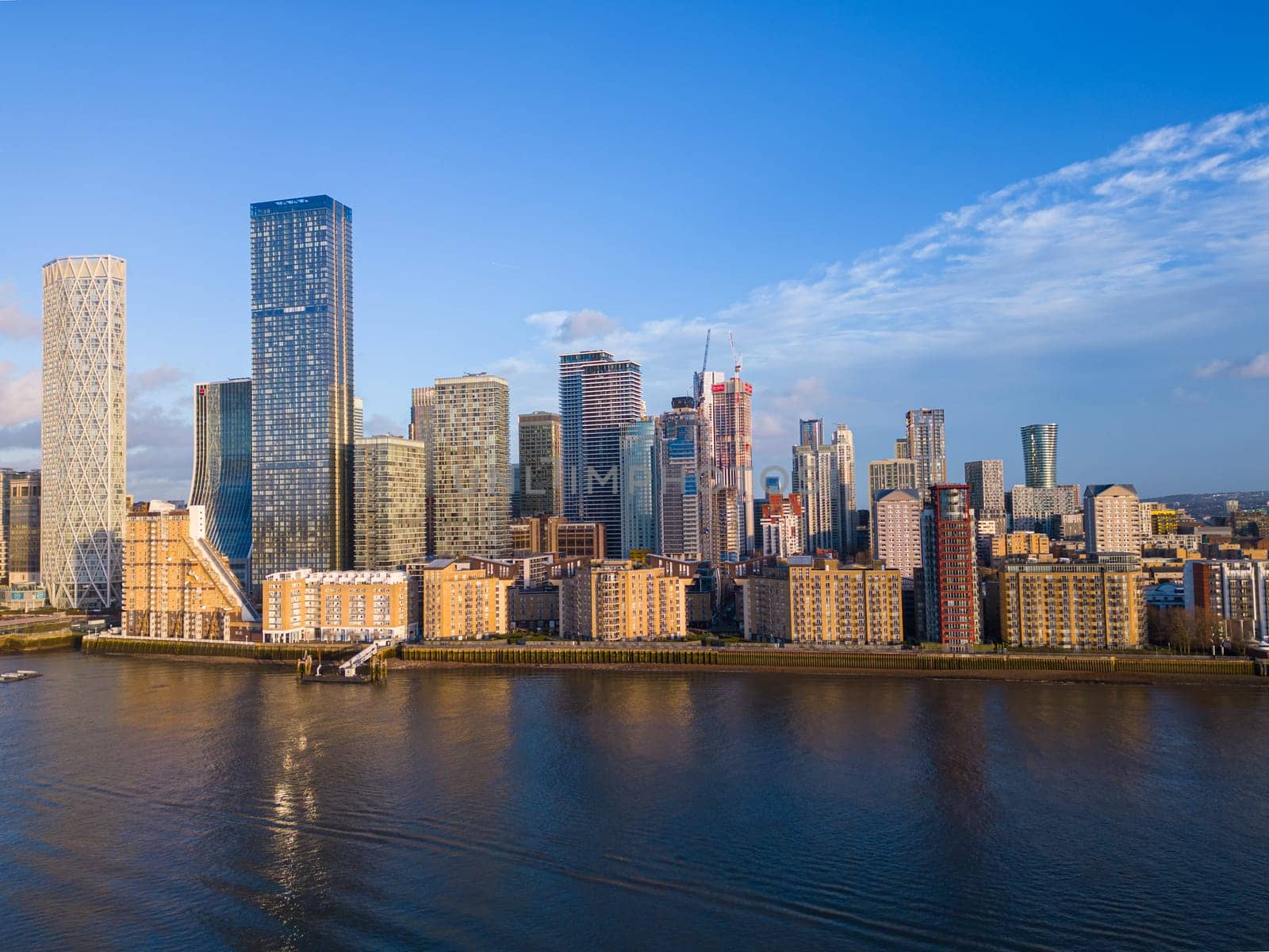 The skyscrapers of Canary Wharf in London on Isle of Dogs - panoramic view - LONDON, UNITED KINGDOM - DECEMBER 20, 2022