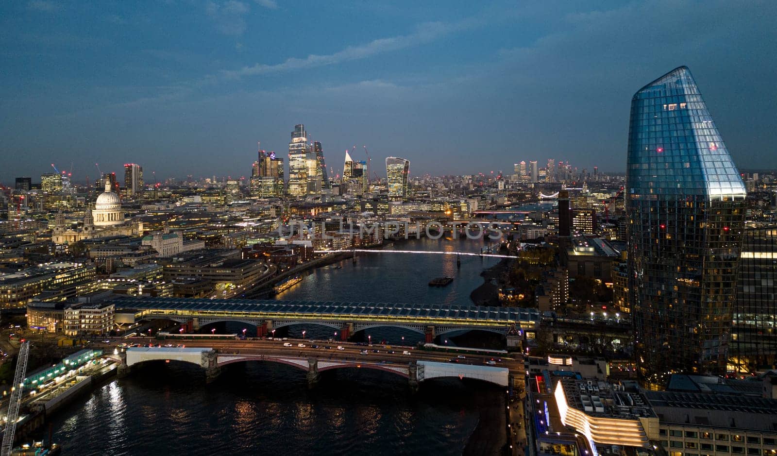 City of London in the evening - aerial view - LONDON, UNITED KINGDOM - DECEMBER 20, 2022