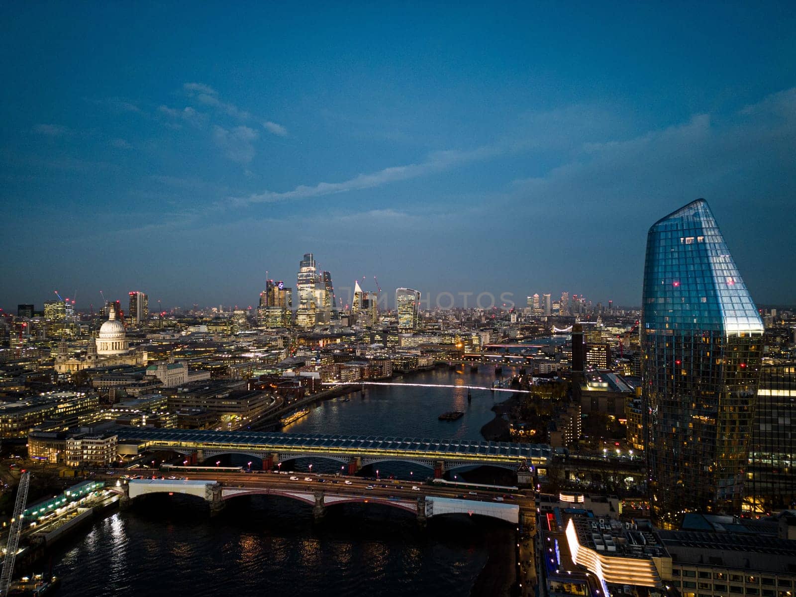 City of London in the evening - aerial view - LONDON, UNITED KINGDOM - DECEMBER 20, 2022