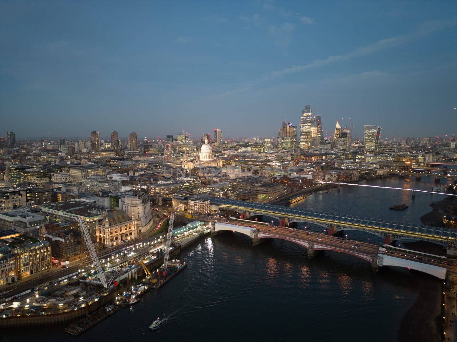 London in the evening - beautiful aerial view at sunset - LONDON, UNITED KINGDOM - DECEMBER 20, 2022
