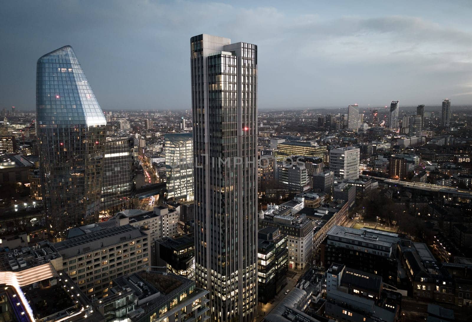 City of London in the evening - aerial view - LONDON, UNITED KINGDOM - DECEMBER 20, 2022