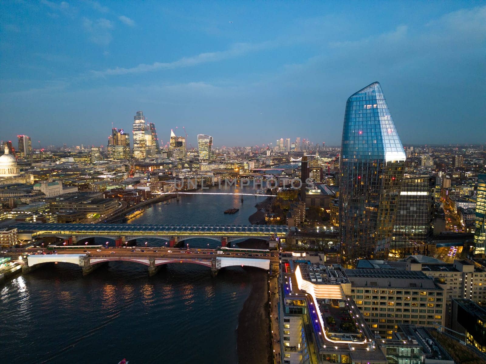 City of London in the evening - aerial view - LONDON, UNITED KINGDOM - DECEMBER 20, 2022
