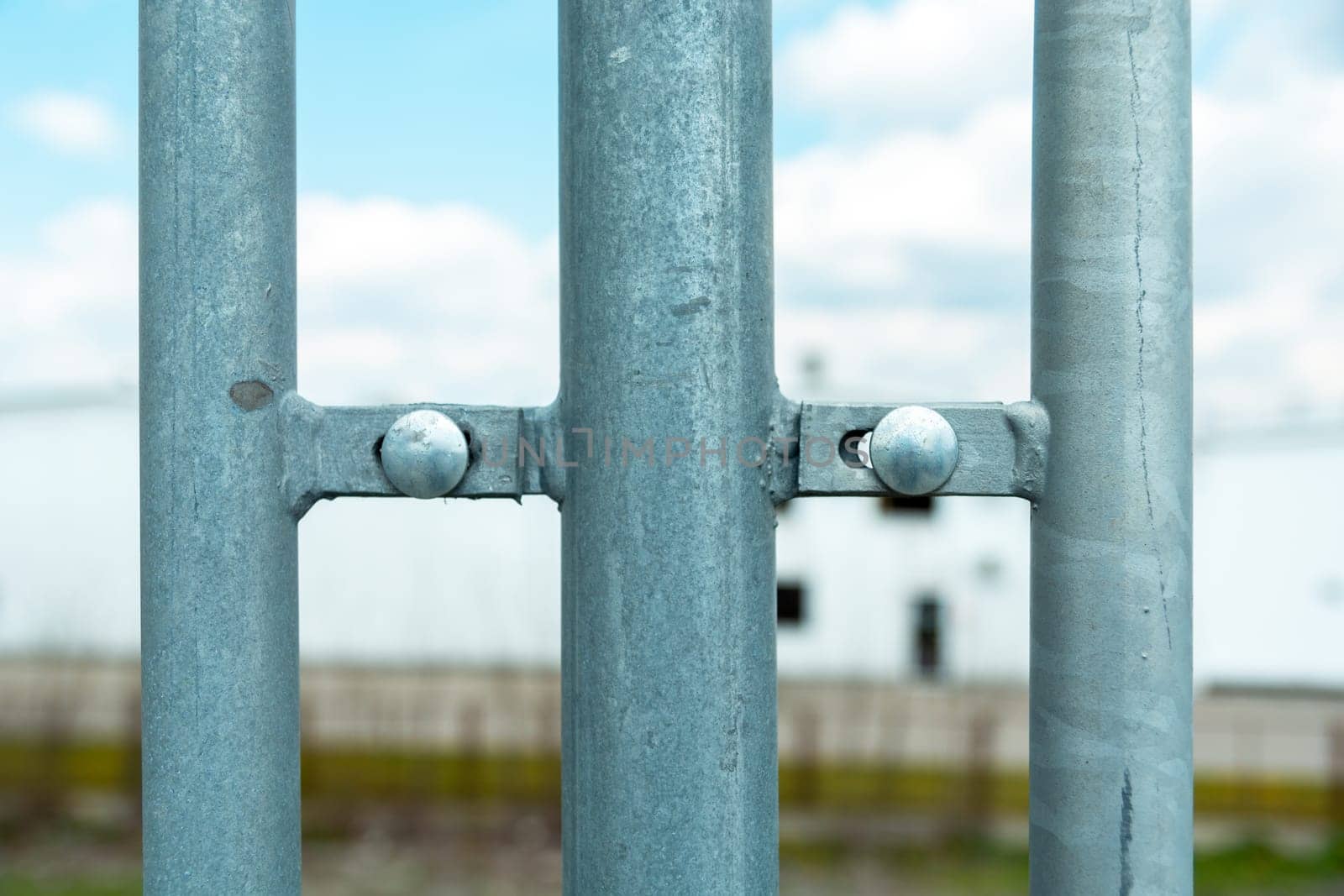Place of screw connection of metal barriers, close up