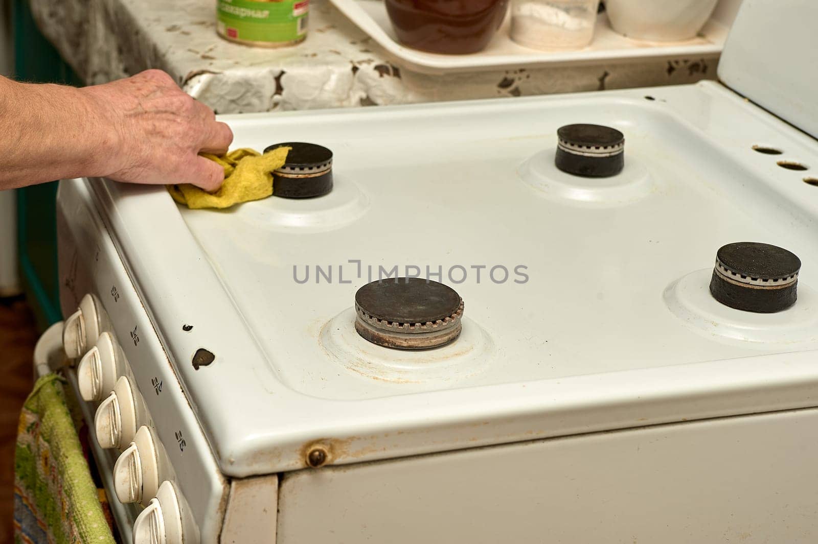 wet cleaning of the gas stove. High quality photo