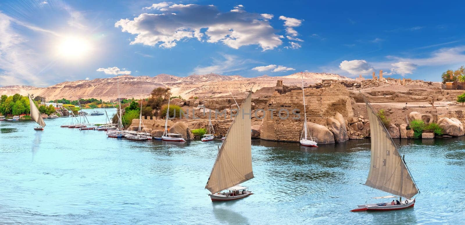 Famous sailboats with Nile River scenery, panoramic view of the Aswan, Egypt.