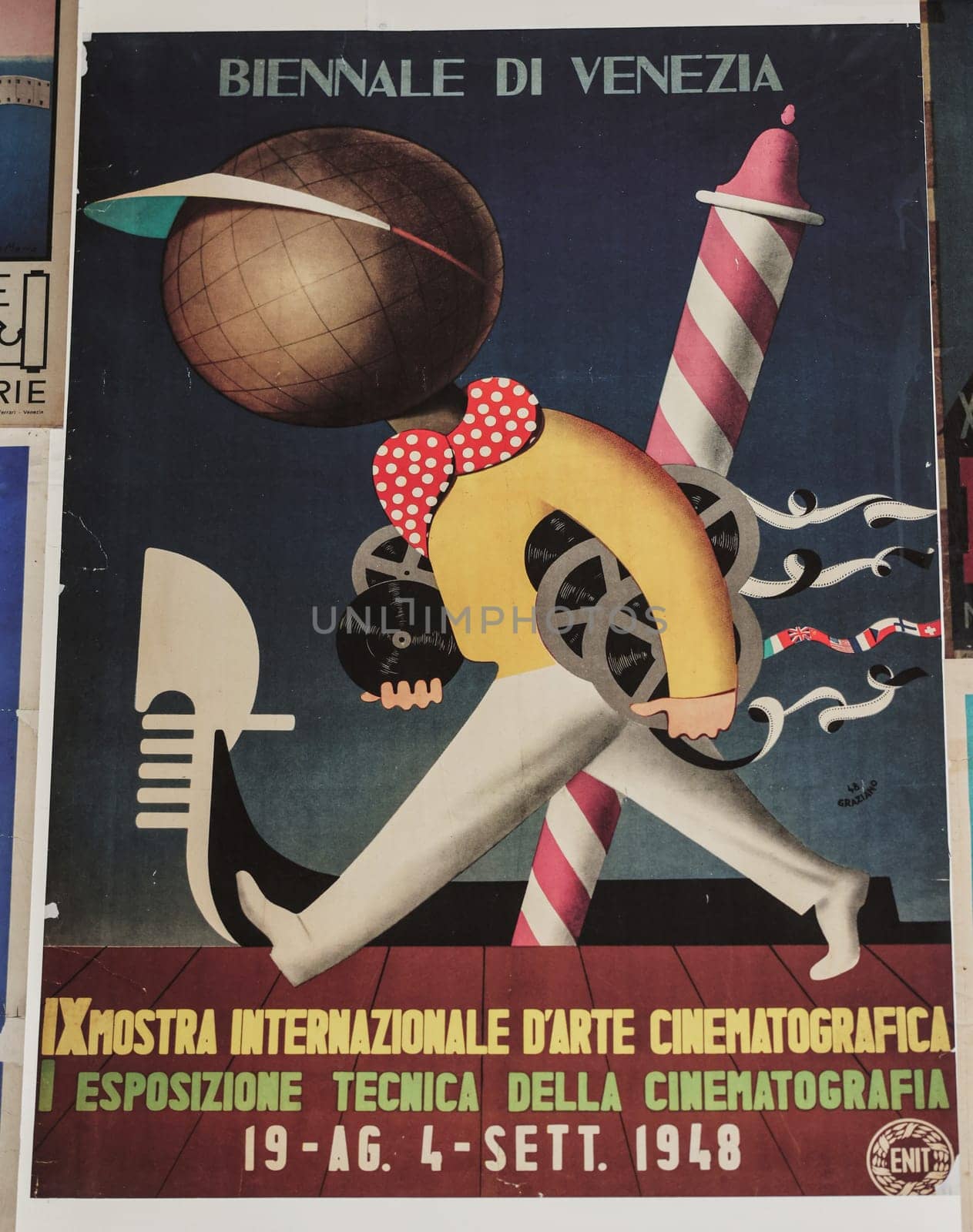 Venice, Italy - September 6, 2022:  59th Venice Art Biennale in Venice. Old posters advertising the Venice Biennale presented in the central pavilion in Giardini