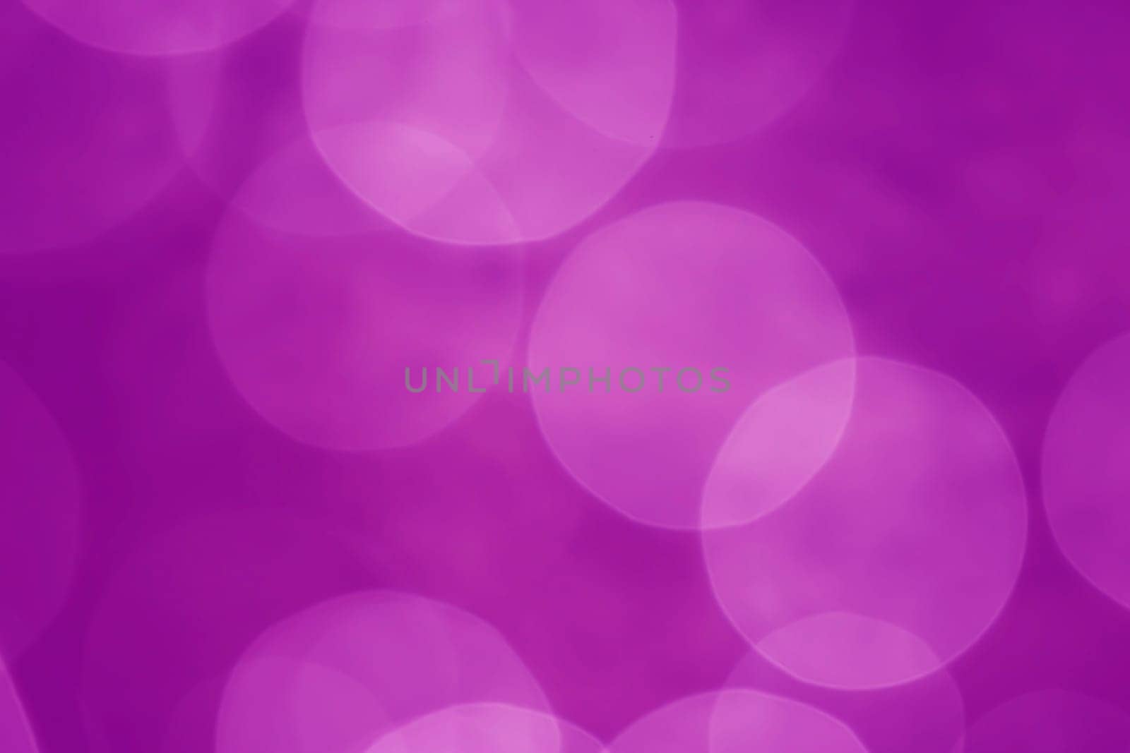Light abstract dark bokeh christmas circle color glitter blurred black background