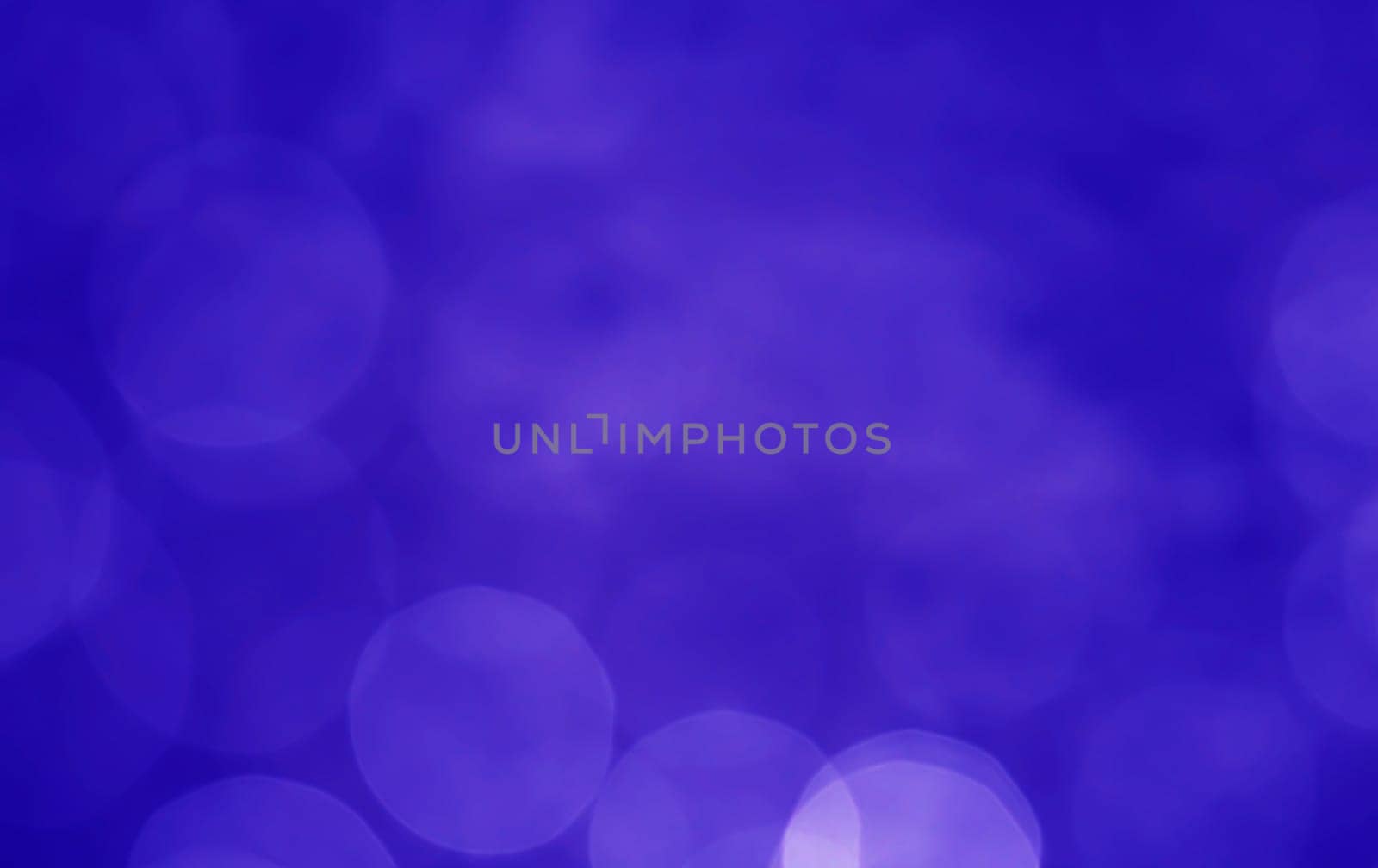 Light abstract dark bokeh christmas circle color glitter blurred black background