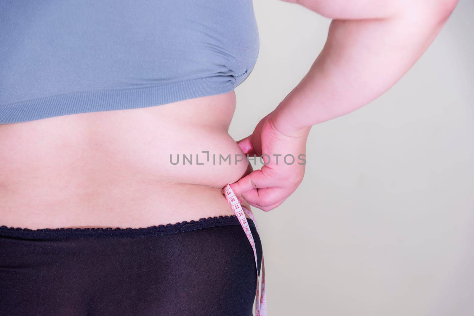 Fat woman, Shape up healthy stomach muscle, and diet lifestyle, to reduce belly concept.