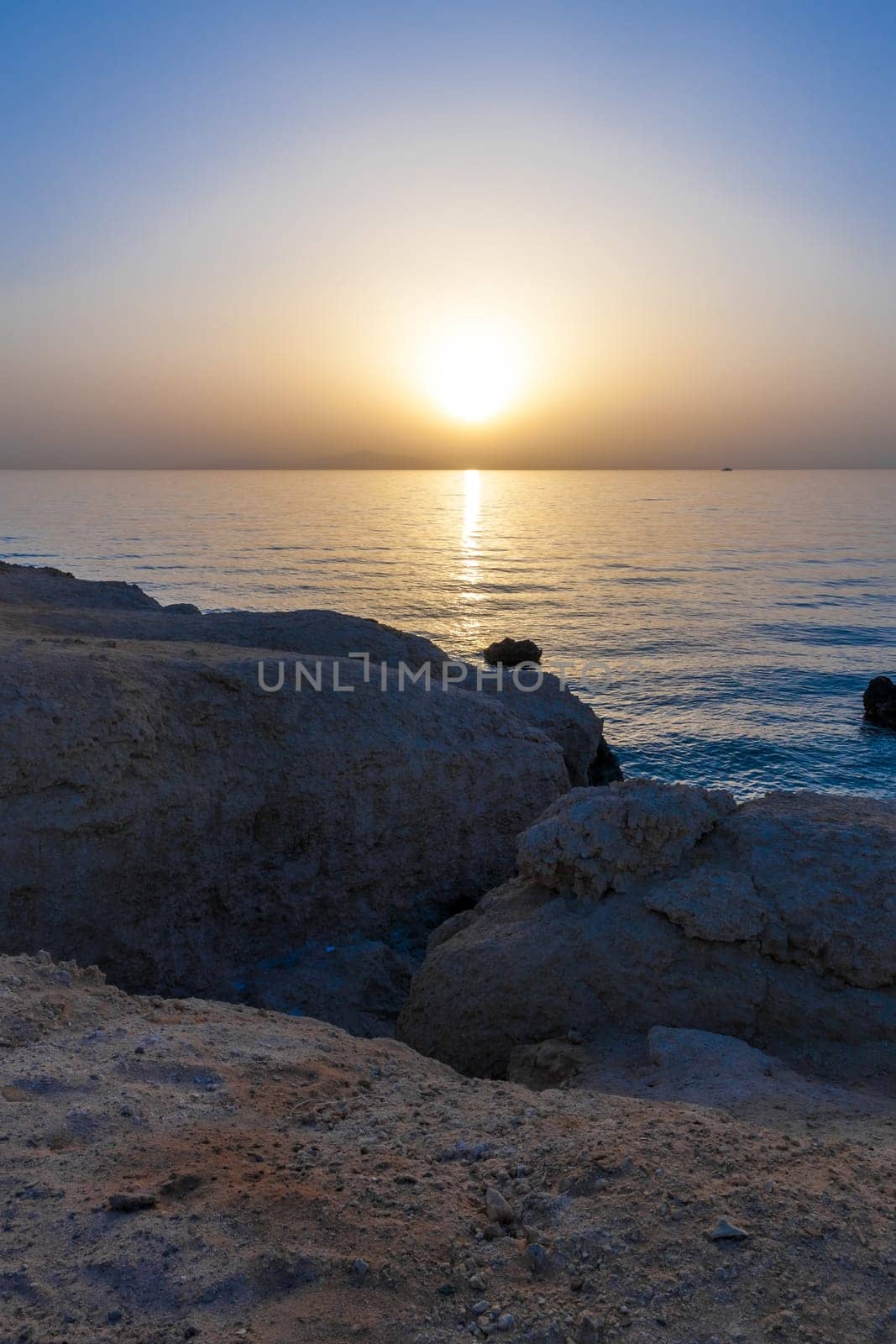 The sunset on the beach of Red Sea in Egypt . Charm an ale the Sheikh