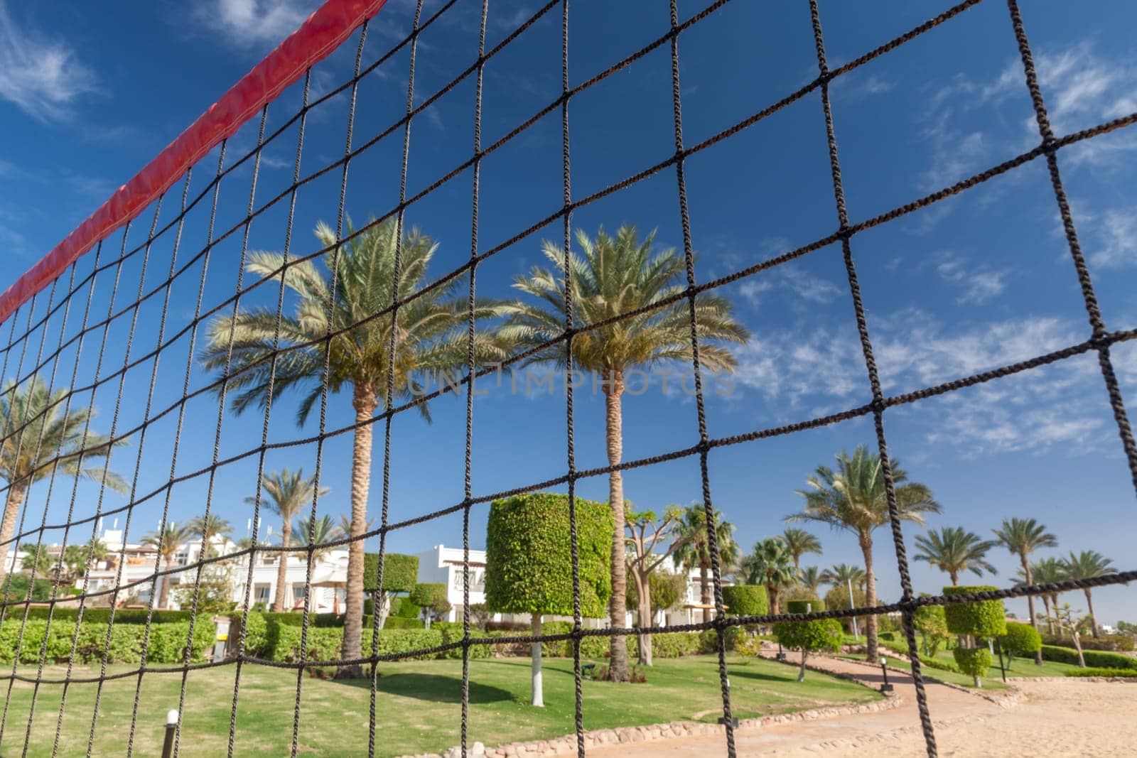 volleyball net on a background blue sky and clouds