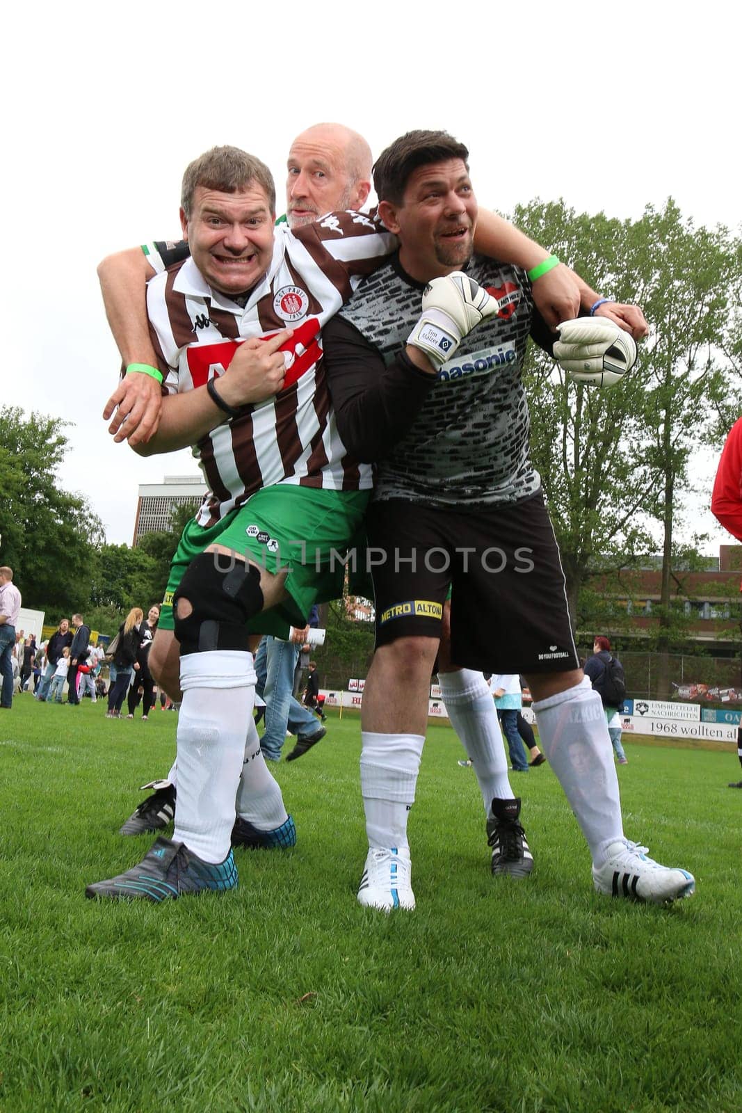 Elton and Tim Maelzer with Peter Lohmeyer,The charity football game Kicking with heart at the Stadion Hoheluft,Hamburg,14.06.2015