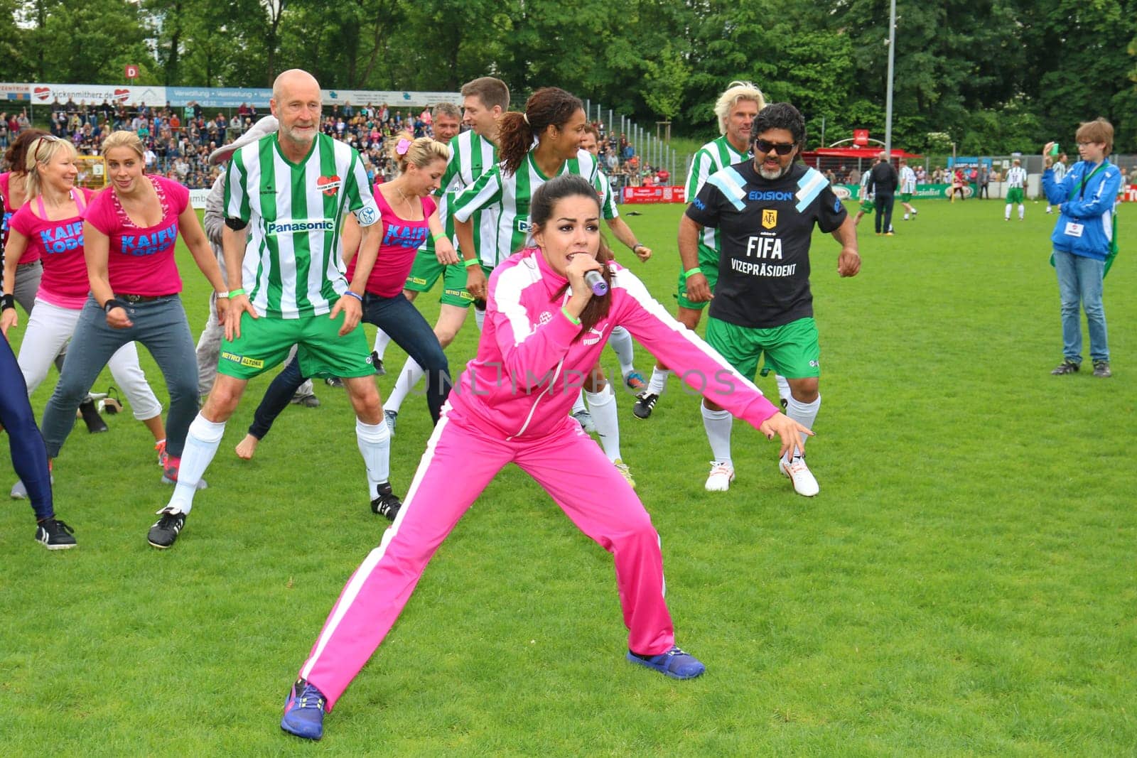Fernanda Brandao waking up with Peter Lohmeyer,Annabelle Mandeng in the background,The charity football game Kicking with heart in the Stadion Hoheluft,Hamburg,14.06.2015