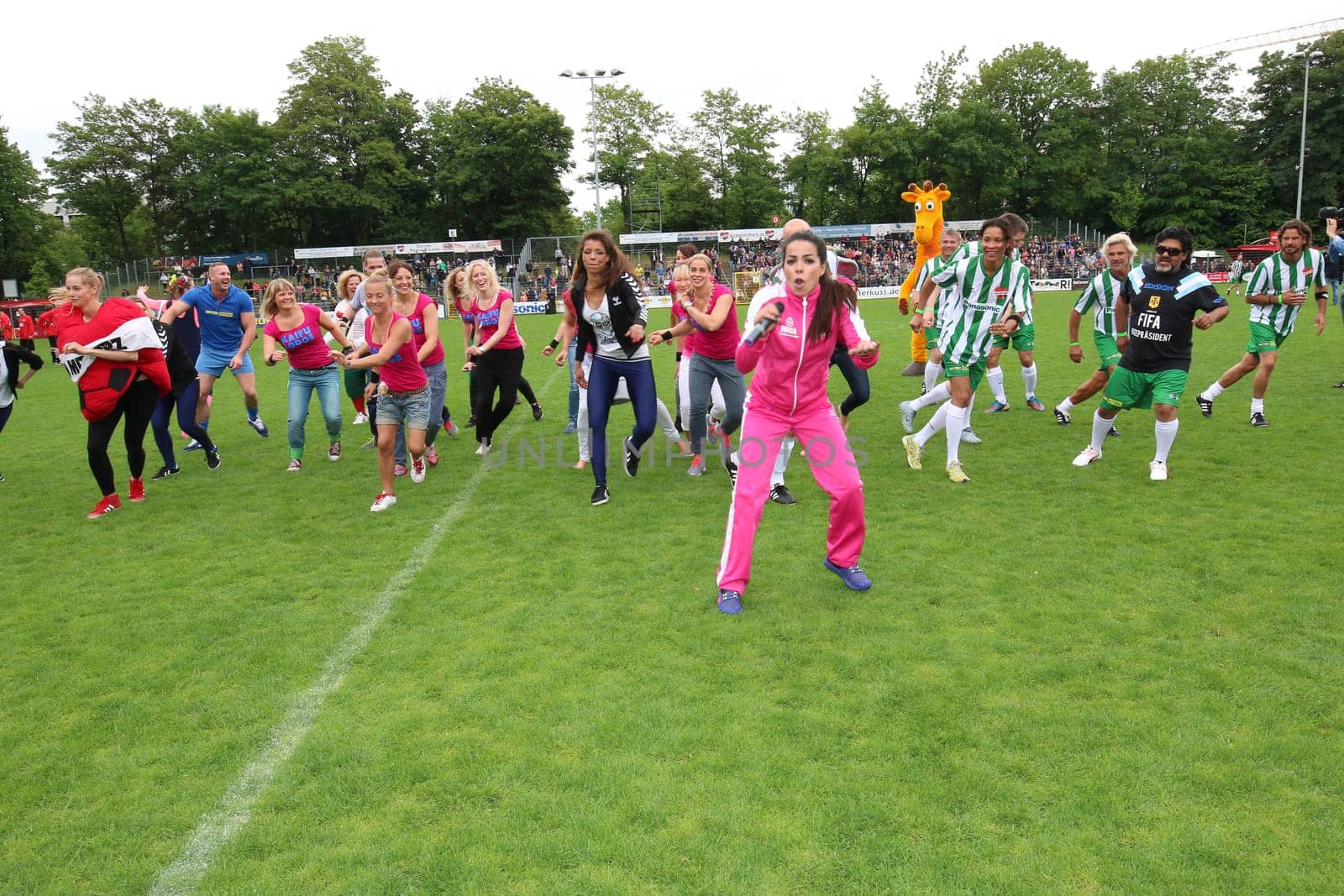 Fernanda Brandao waking up with Peter Lohmeyer,Annabelle Mandeng in the background,The charity football game Kicking with heart in the Stadion Hoheluft,Hamburg,14.06.2015