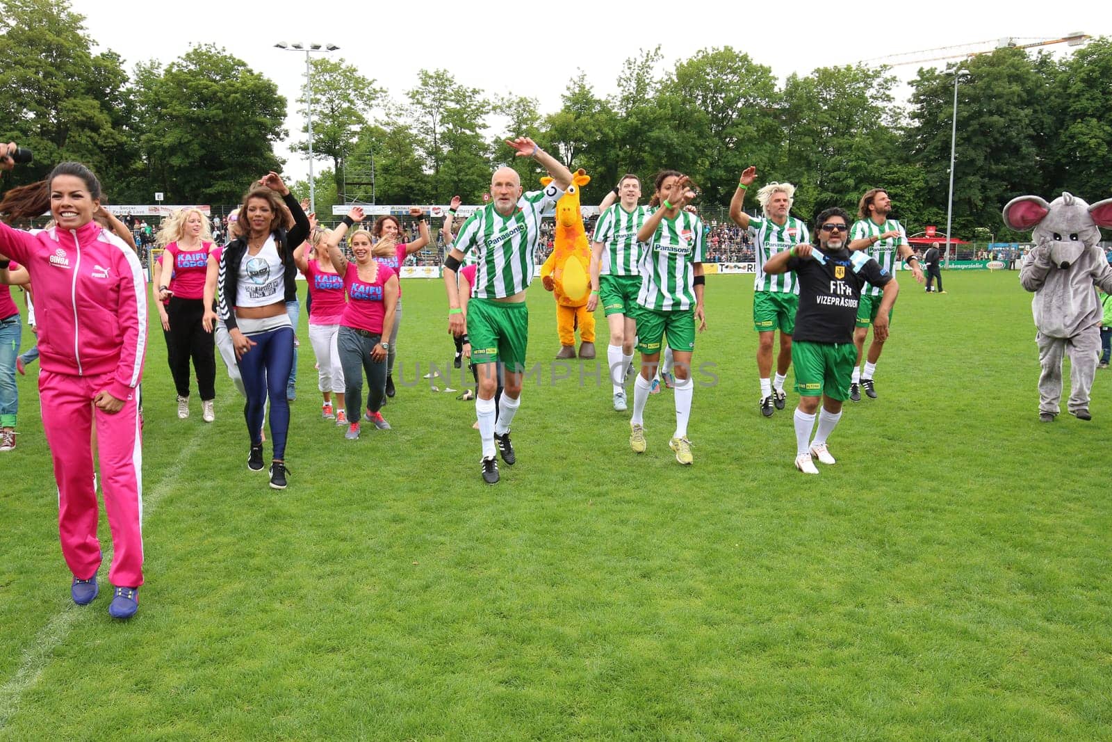 Fernanda Brandao waking up with Peter Lohmeyer,Annabelle Mandeng in the background,The charity football game Kicking with heart in the Stadion Hoheluft,Hamburg,14.06.2015
