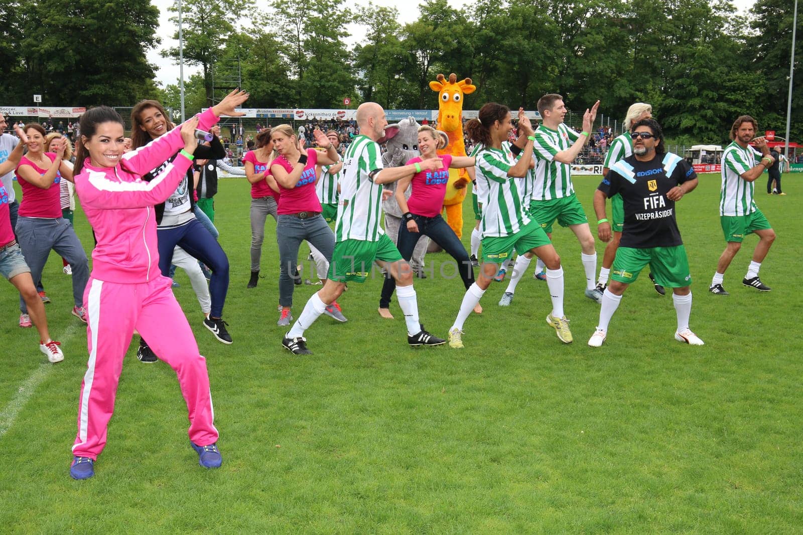 Fernanda Brandao waking up with Peter Lohmeyer,Annabelle Mandeng in the background,The charity football game Kicking with heart in the Stadion Hoheluft,Hamburg,14.06.2015