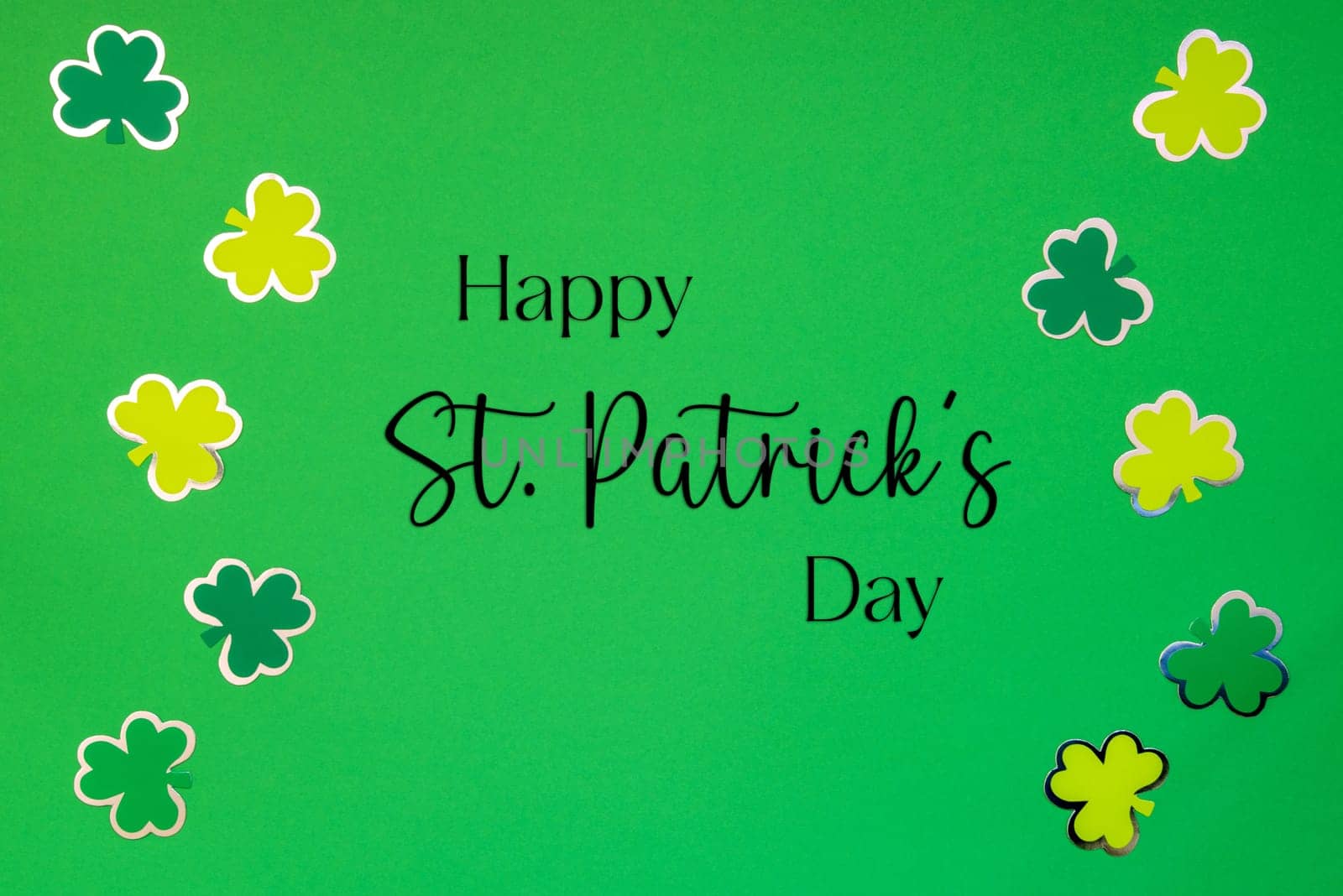 Flat Lay With English Text Happy St. Patrick's Day. Green Paper Background With Saint Patrick's Day Decoration.