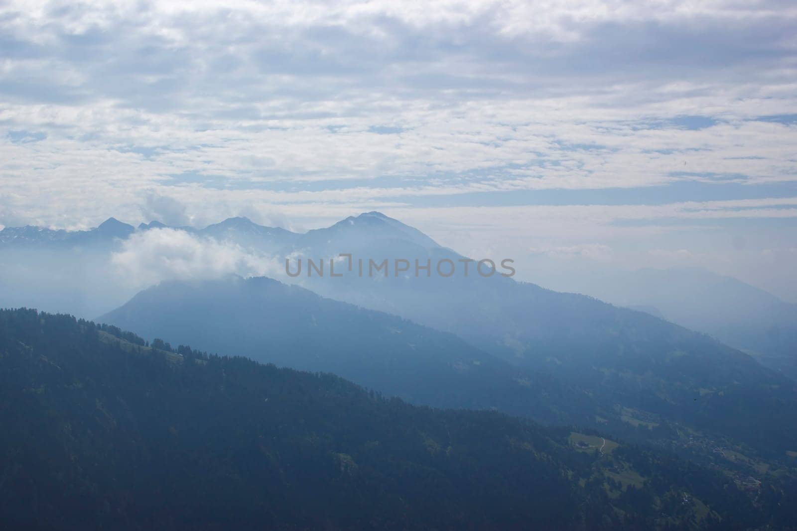 Landscape of Lienz Dolomites in Austria. Road and panorama of massive Alpine mountains