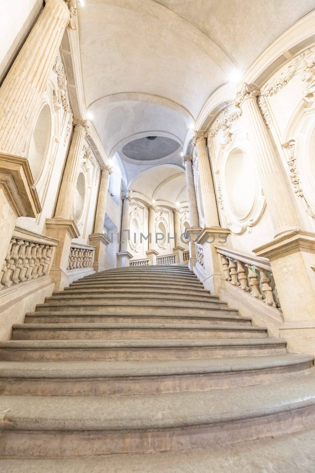 Turin, Italy - Circa January 2022: luxury marble staircase. Antique architecture interior design