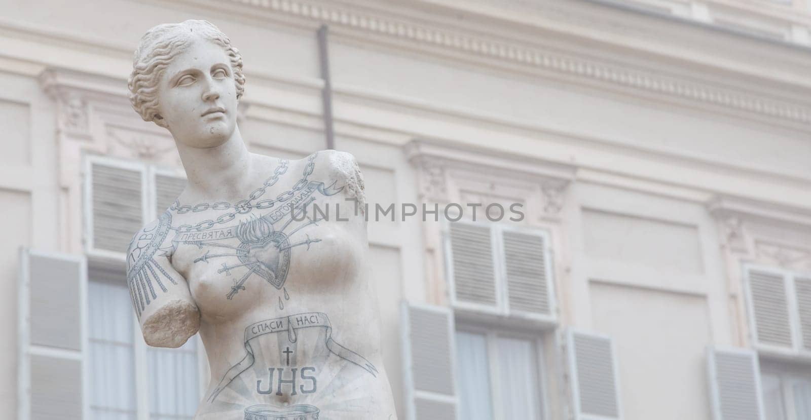 Turin, Italy - Circa January 2022: Venus de Milo with tattoos by Fabio Viale. White marble and coloured ink