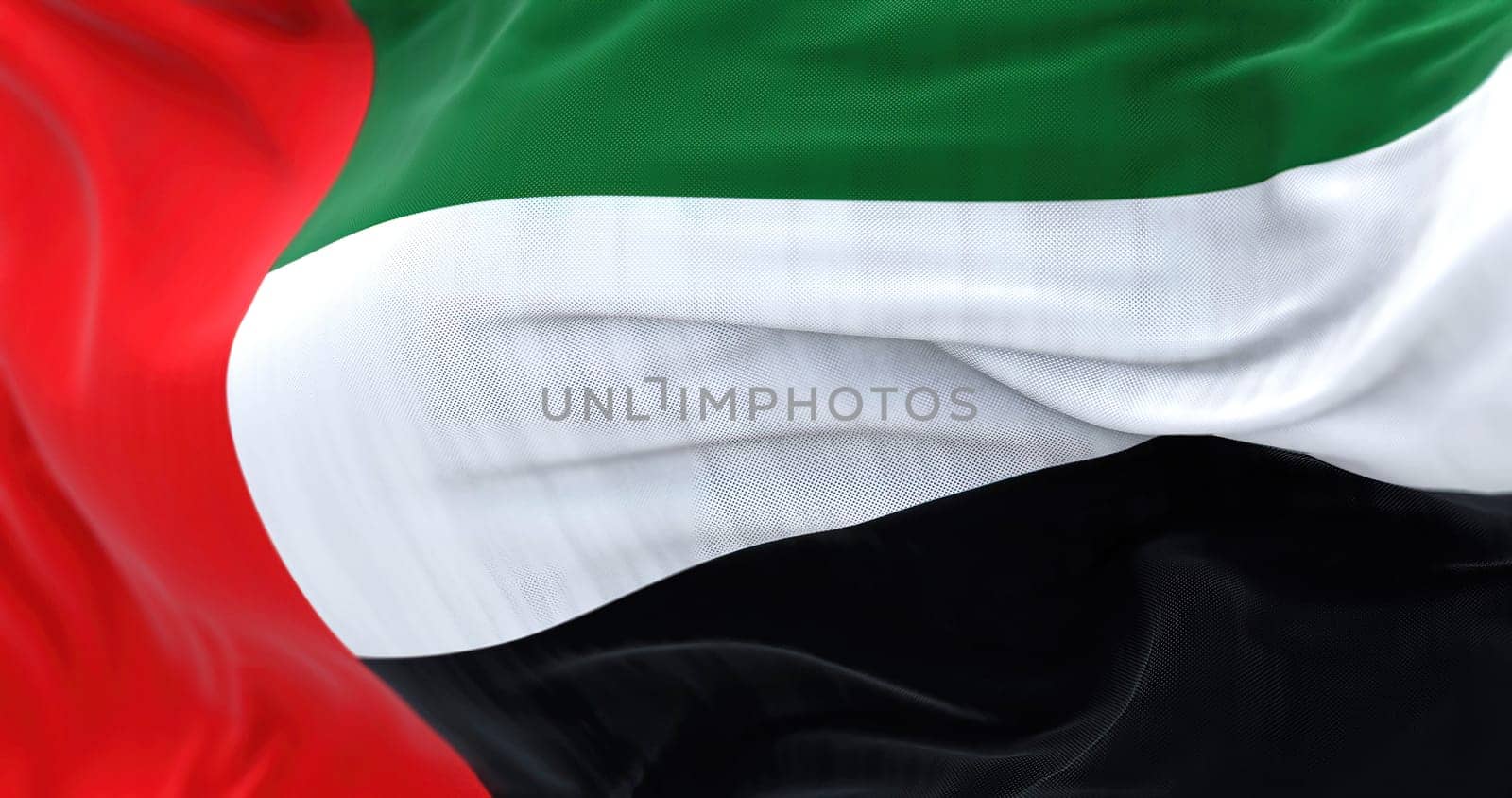 Close-up view of the United Arab Emirates national flag waving in the wind. The Emirates is a country in Western Asia. Rippled fabric. Textured background. Selective focus. Realistic 3d illustration