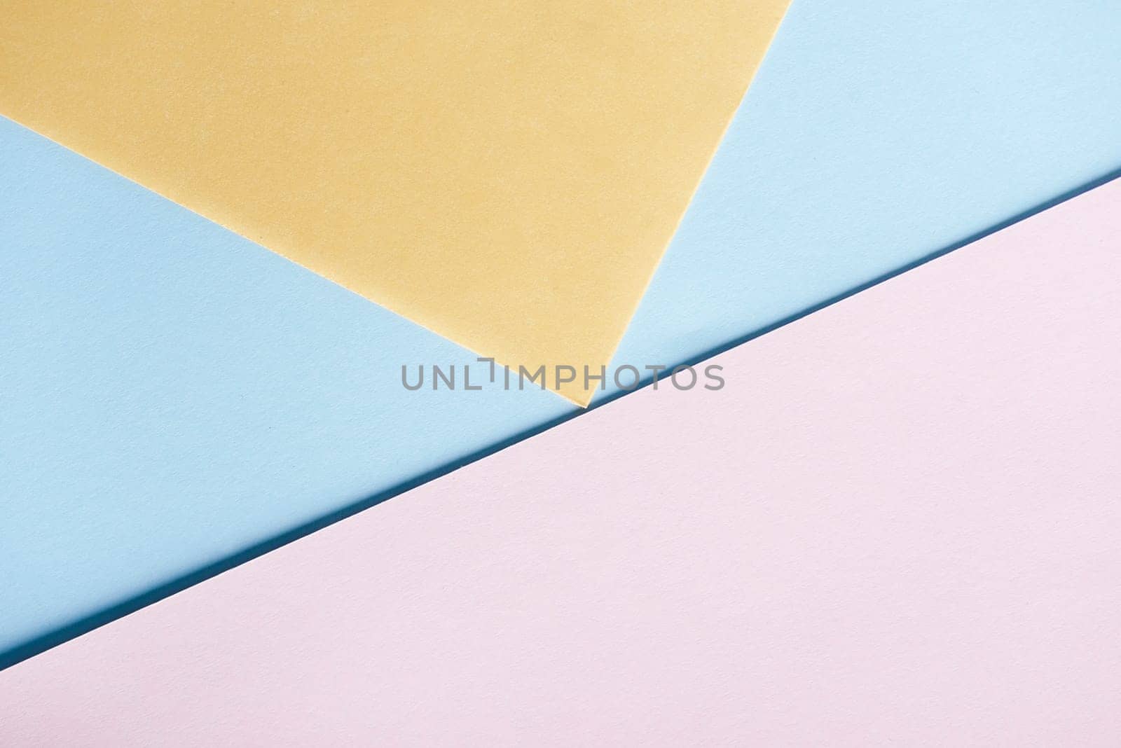 Abstract pastel geometry creative background top view. Modern and trendy minimal geometric paper composition. Flat lay minimalist layout.