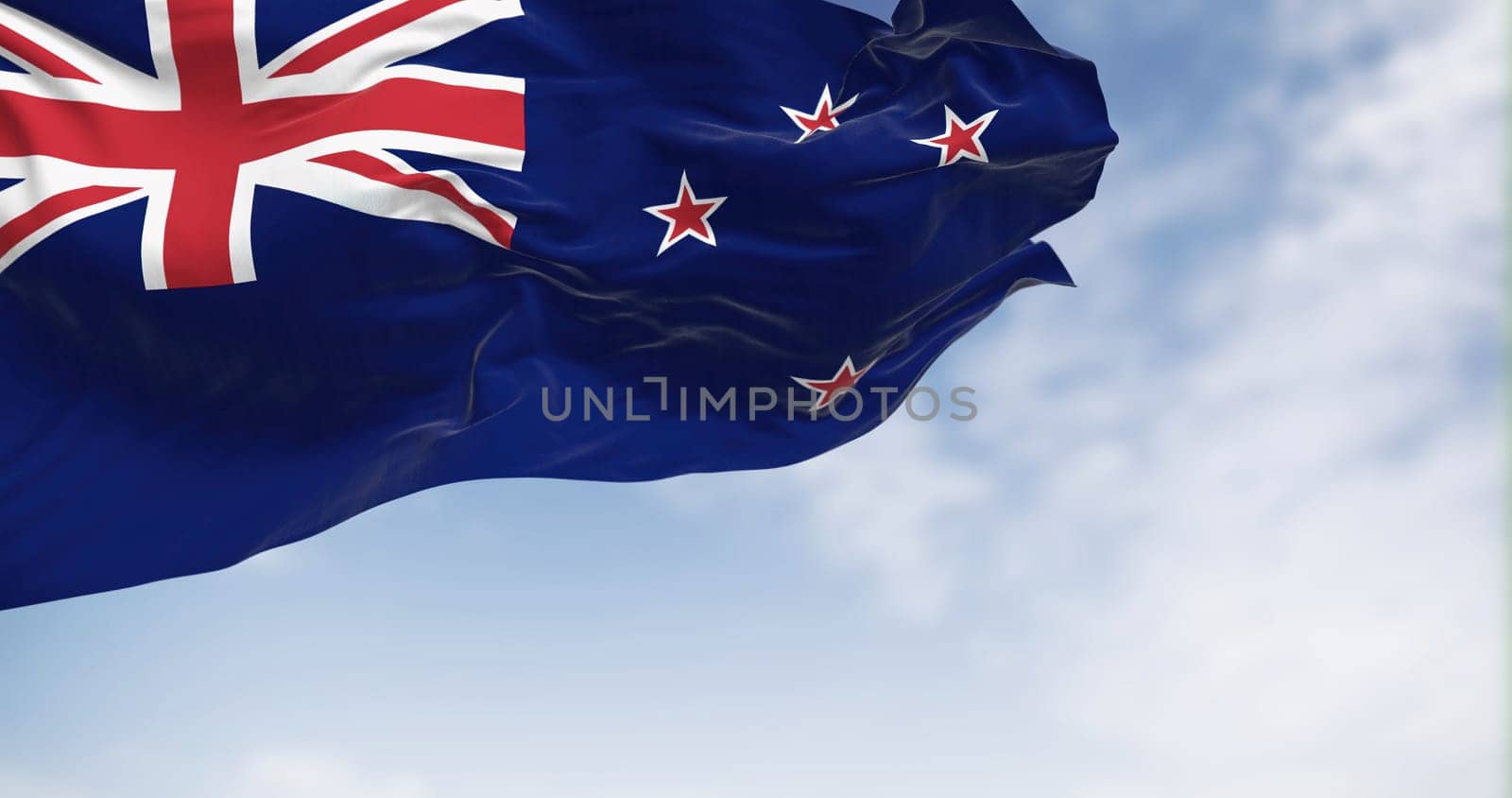 New Zealand national flag waving on a clear day. Blue Ensign with Union Jack and red stars on representing Southern Cross. Rippled fabric. Realistic 3D illustration