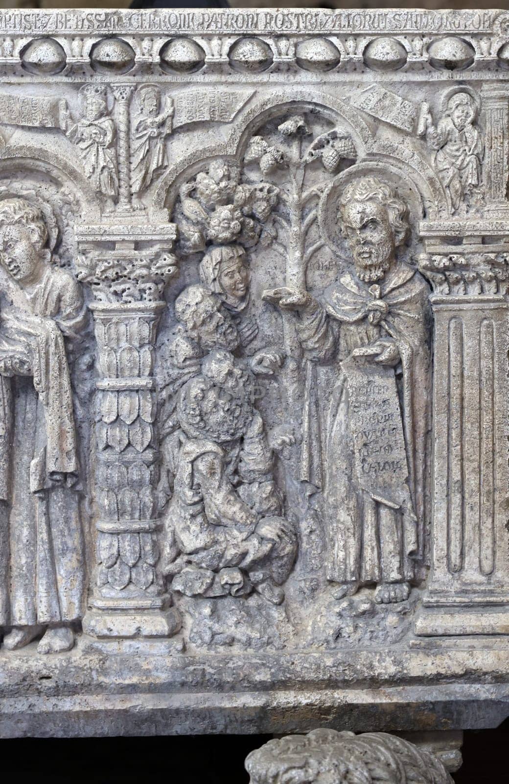 Massa Marittima, Italy - Sept 11, 2022:  Monumental baptismal font, with a rectangular bath surmounted by a small temple. The baptistery dates from 1267. Cathedral of Saint Cerbonius in Massa Marittima. Italy