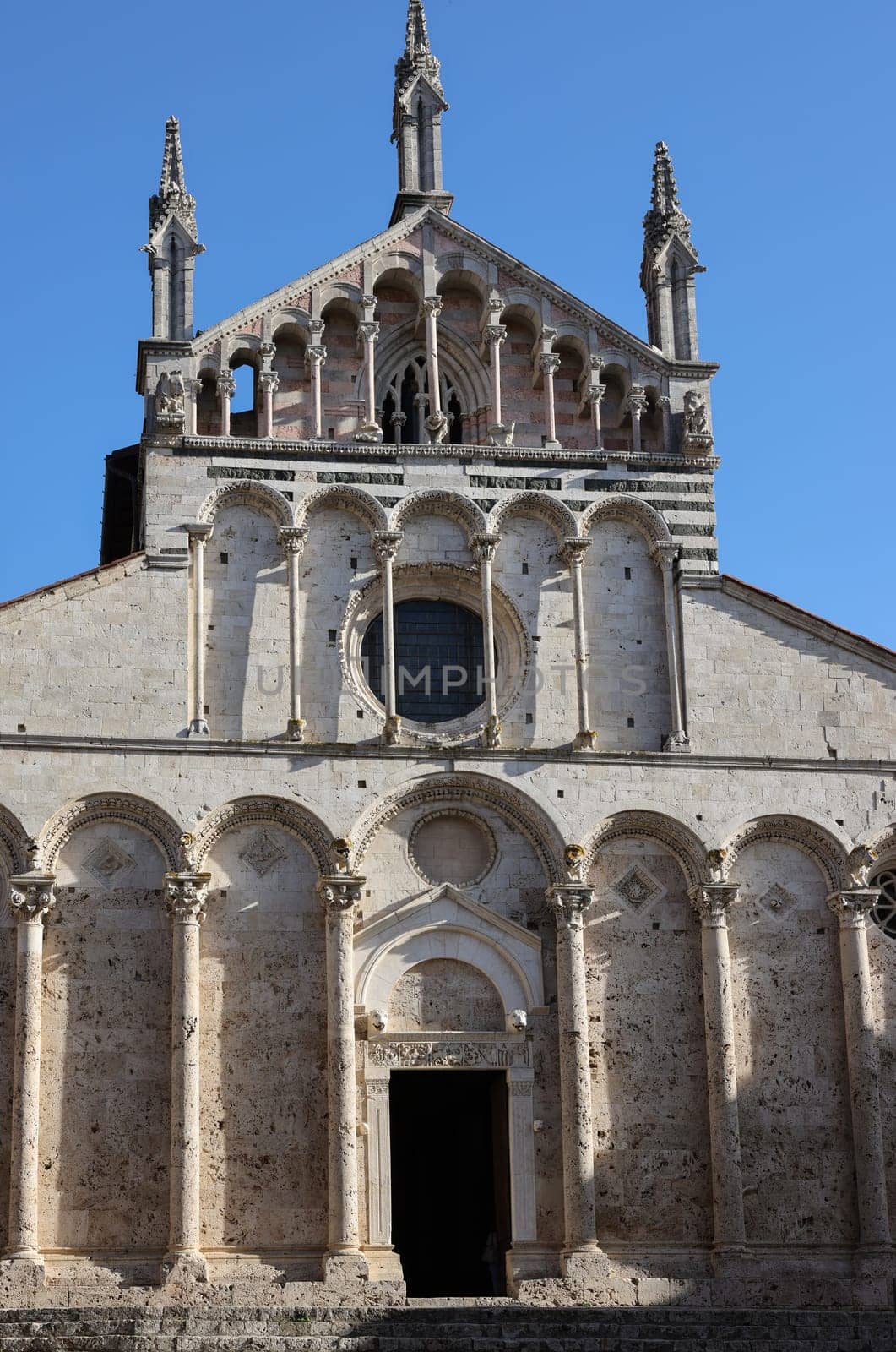 The Cathedral of Saint Cerbonius with Bell tower at the Garibaldi square in Massa Marittima. Italy